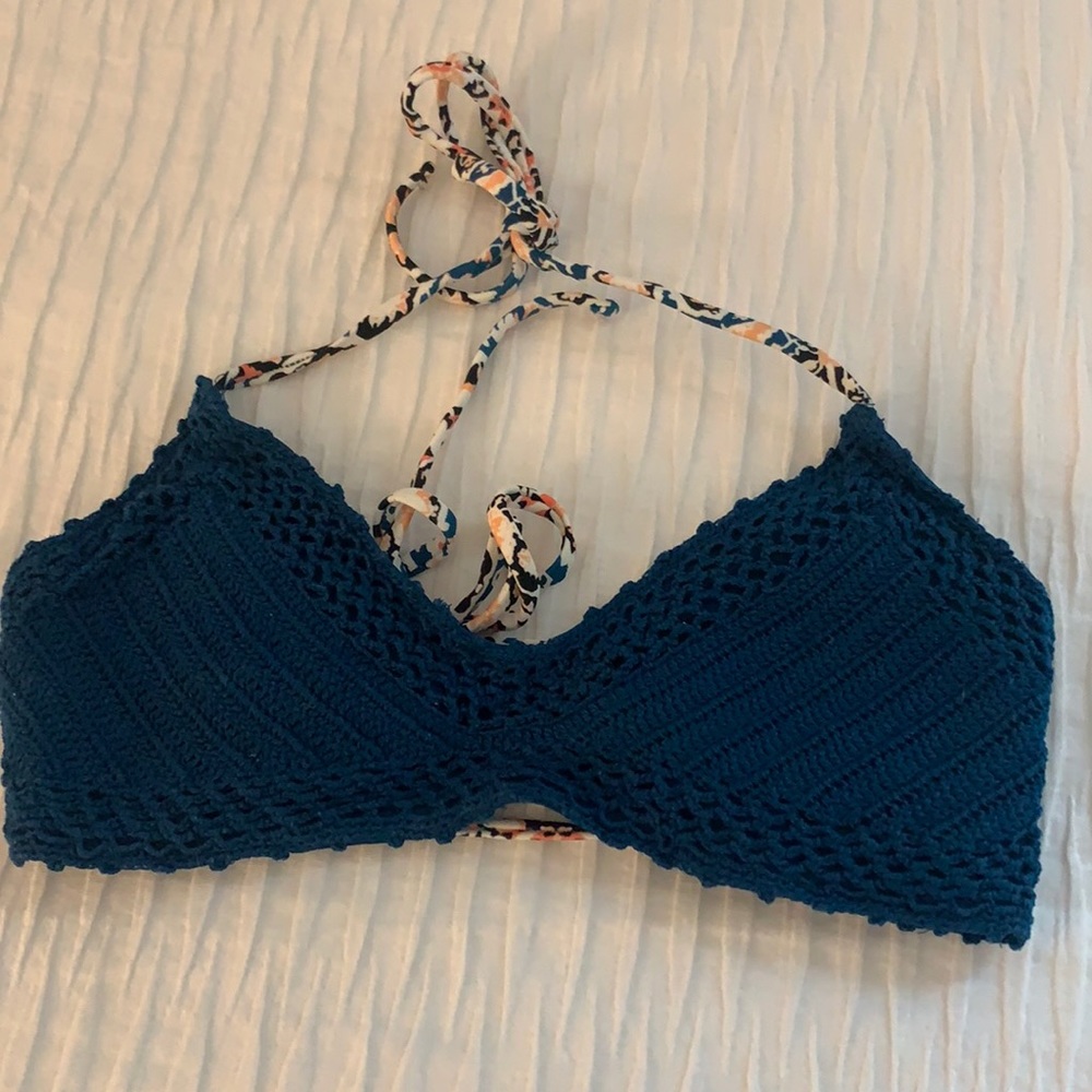 Navy blue crochet bathing suit top.